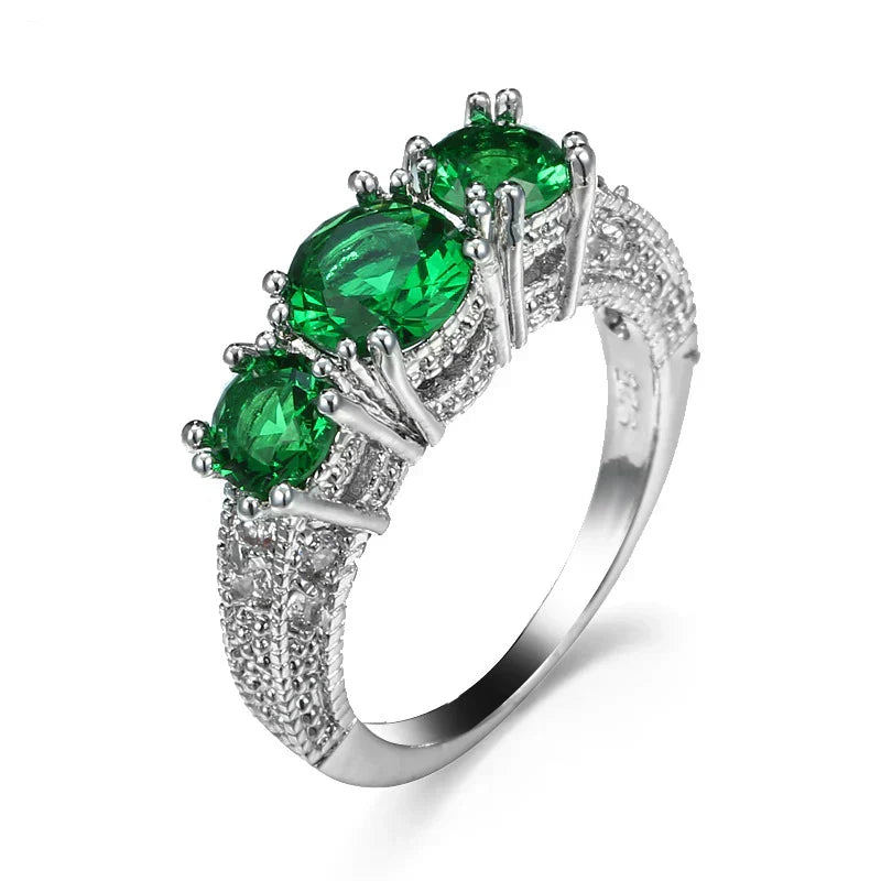 Timeless Ring with Sparkling Emeralds